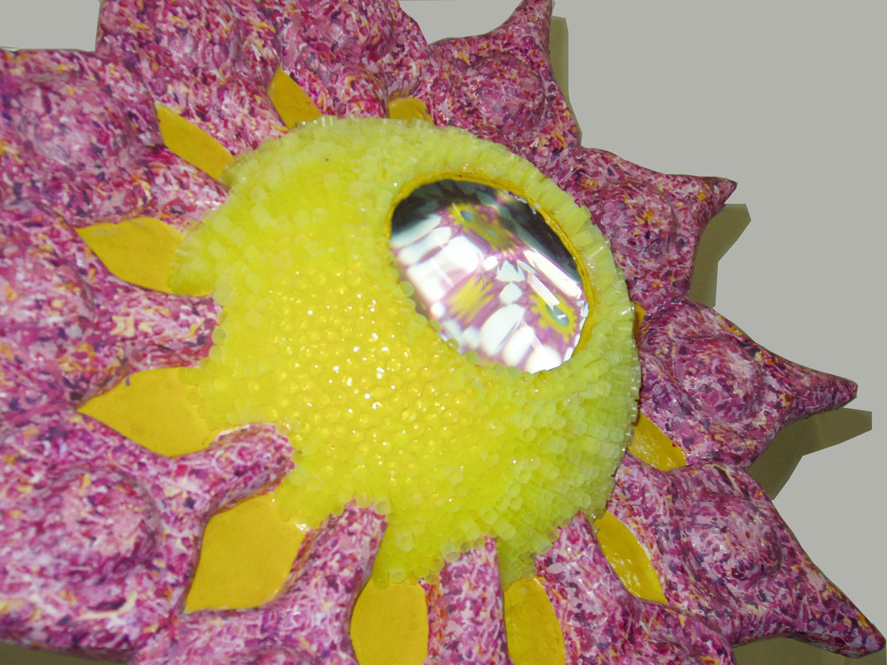 Ioanna Kazaki, Microcosmos–Macrocosmos, 17 Flowers, Polyester, digital images, papier mache, collage, stainless mirror, iron, magnifying lenses, lights. Sound: Stadium Crowd Noise, Dimentions: 150x30x30cm or 165x45x45cm each/ Installation view AcroArt Projects-Thessaloniki, 2026, © & Courtesy the artist