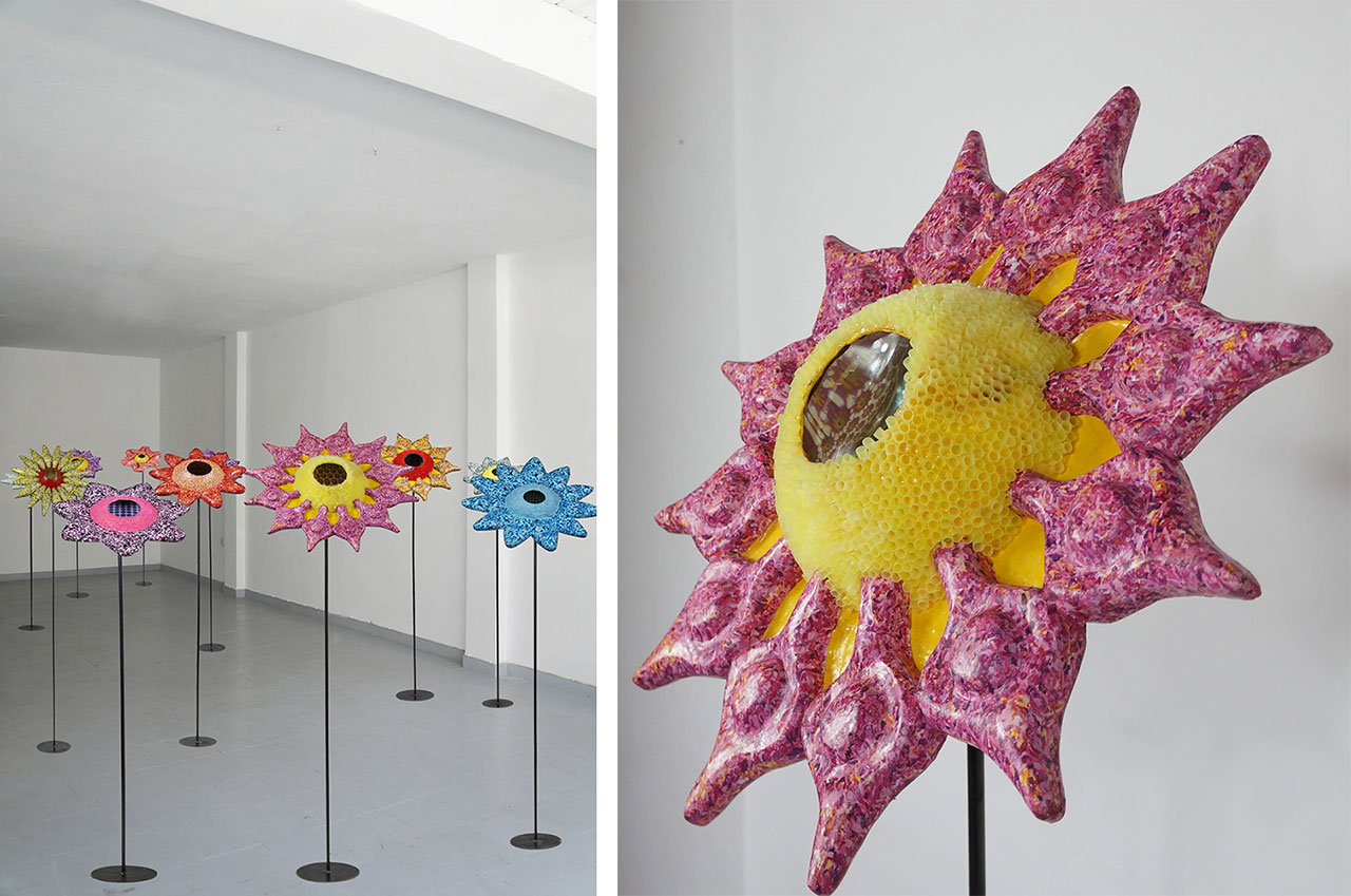 Ioanna Kazaki, Microcosmos–Macrocosmos, 17 Flowers, Polyester, digital images, papier mache, collage, stainless mirror, iron, magnifying lenses, lights. Sound: Stadium Crowd Noise, Dimentions: 150x30x30cm or 165x45x45cm each/ Installation view AcroArt Projects-Thessaloniki, 2026, © & Courtesy the artist