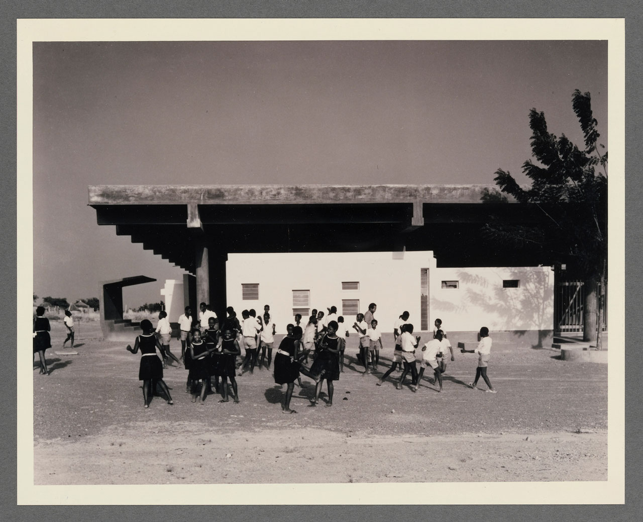 Children outside Bolgatanga Library, Ghana. December 1967. Photograph: Willis E. Bell. J. Max Bond Jr. papers, 1955–2009, Department of Drawings & Archives, Avery Architectural & Fine Arts Library, Columbia University. © Mmofra Foundation.