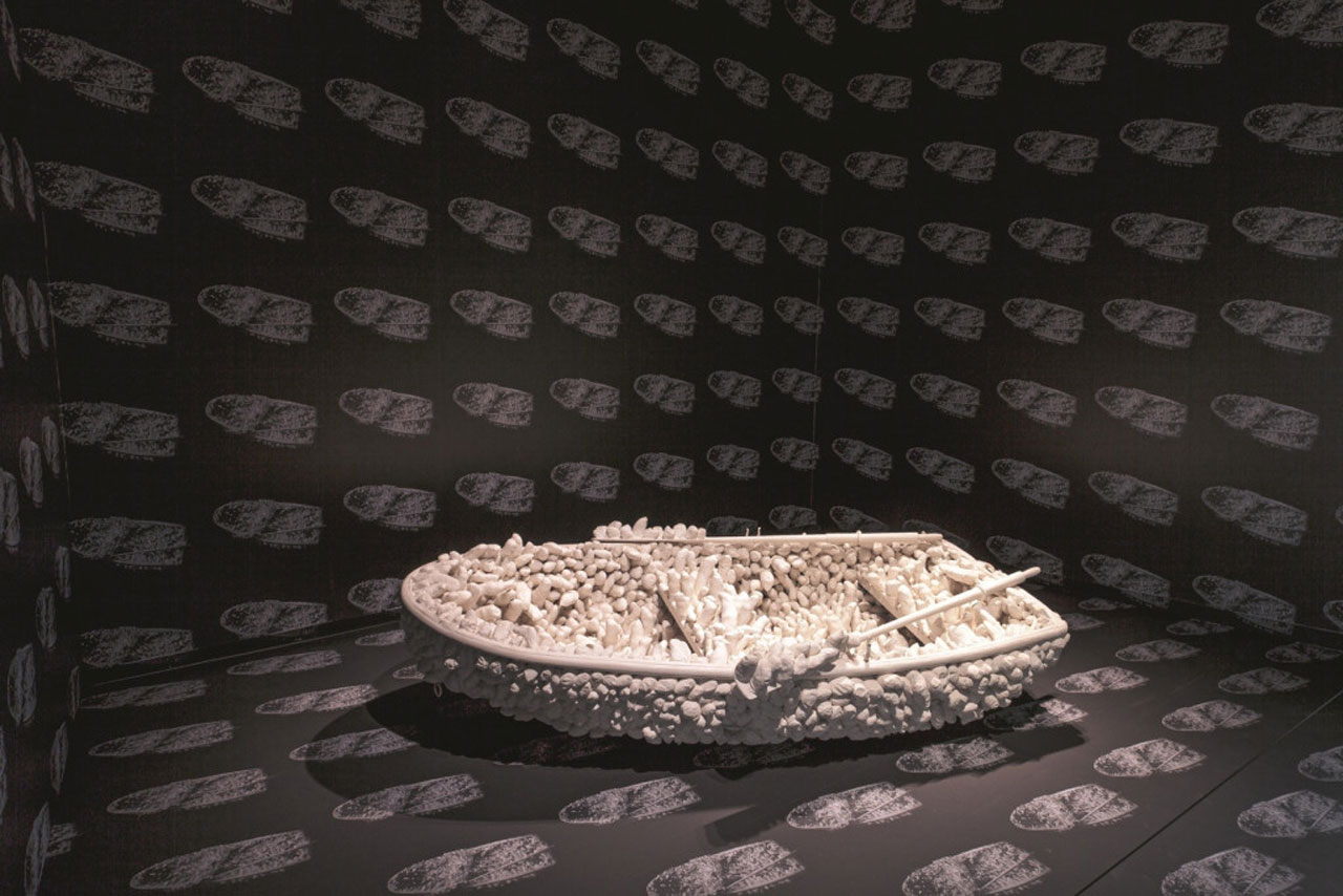 Yayoi Kusama, 'Aggregation: One Thousand Boats Show', 1963. Rowboat and oars covered by plaster castings in white cotton, a pair of women’s shoes, and black-and white posters; boat. Collection Stedelijk Museum Amsterdam, gift of the artist. © YAYOI KUSAMA