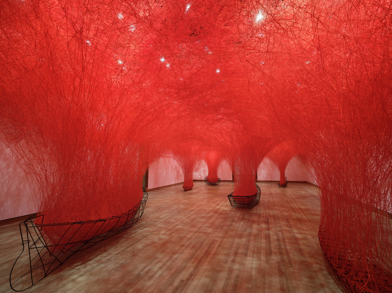 Installation view of Chiharu Shiota’s Uncertain Journey (2016/2026) in the exhibition Chiharu Shiota: The Soul Trembles, the Montreal Museum of Fine Arts. Collection of the artist. © Chiharu Shiota / VG Bild-Kunst, Bonn / CARCC Ottawa 2026. Photo MMFA, Julie Ciot