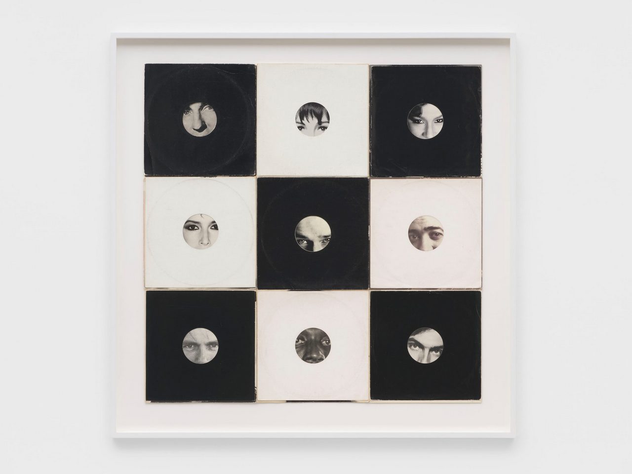 Christian Marclay, Oculi (Two Eyes Checkerboard), 2026, Nine record covers and sleeves, 94.6 x 94.6 cm | 37 1/4 x 37 1/4 in., 112.6 x 112.6 x 4.5 cm | 44 1/4 x 44 1/4 x 1 3/4 in. (framed), © Christian Marclay, Courtesy the artist and White Cube Gallery