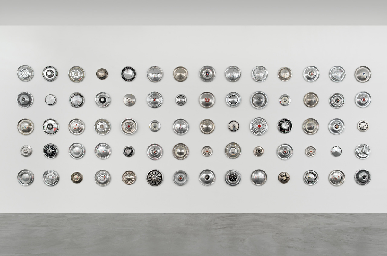 Sylvie Fleury, She-Devils on Wheels – Hubcaps Collection, 1997, Part of She Devils on Wheels – Headquarters, 1997, Hubcaps, Photo: Stefan Altenburger Photography, Zürich, © Sylvie Fleury, Curtesy the artist and Sammlung Migros Museum für Gegenwartskunst