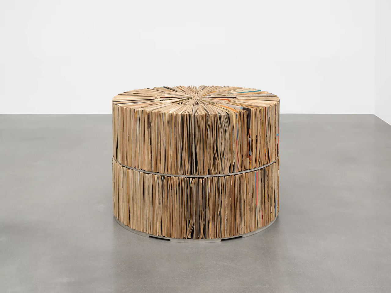 Lorna Simpson, Well Rounded, 2026, Ebony magazines, steel, 71.3 x 105.4 x 105.4 cm / 28 1/8 x 41 1/2 x 41 1/2 in, © Lorna Simpson, Photo: Jame Wang, Courtesy the artist and Hauser & Wirth Gallery