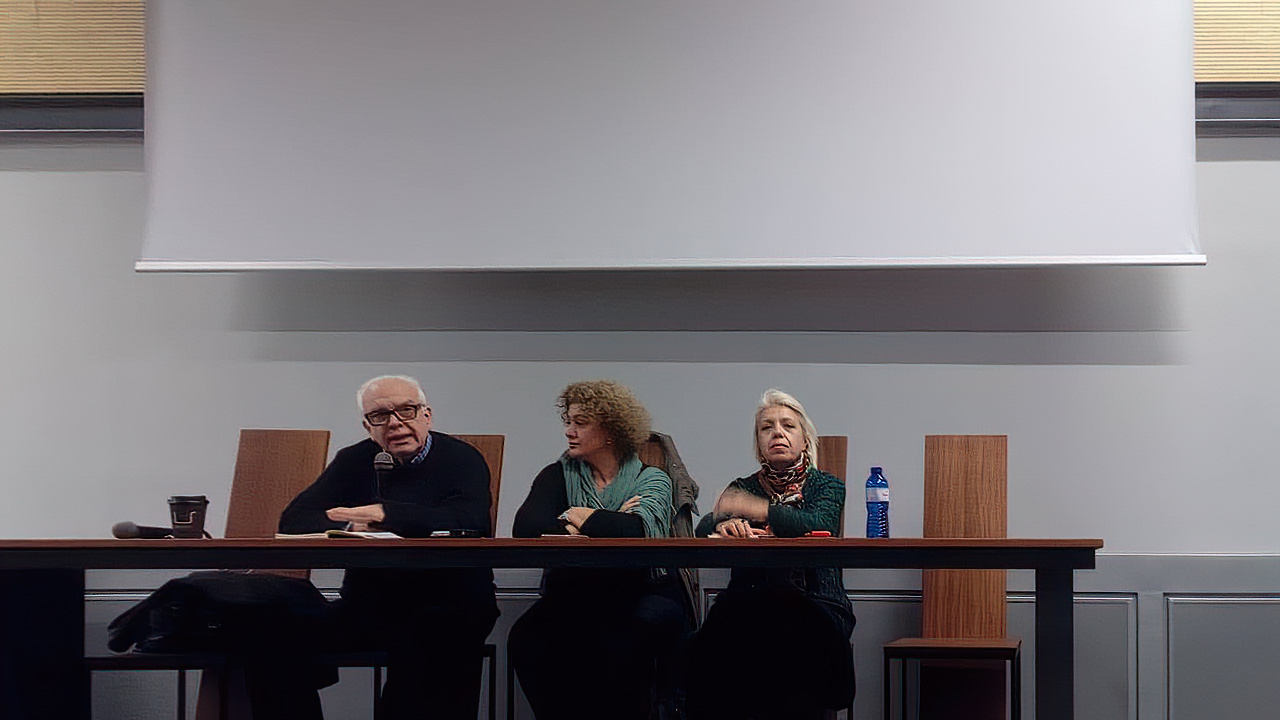 Denys Zacharopoulos — Art Historian, Theorist, and Curator — speaking at the ASFA Amphitheater about the book by Journalist, Art Critic & Exhibition Curator Efi Michalarou; in the middle, the President of the Association of European Journalists and author of the book Efi Michalarou, Apr. 2019, Dimitris Lempesis Archive