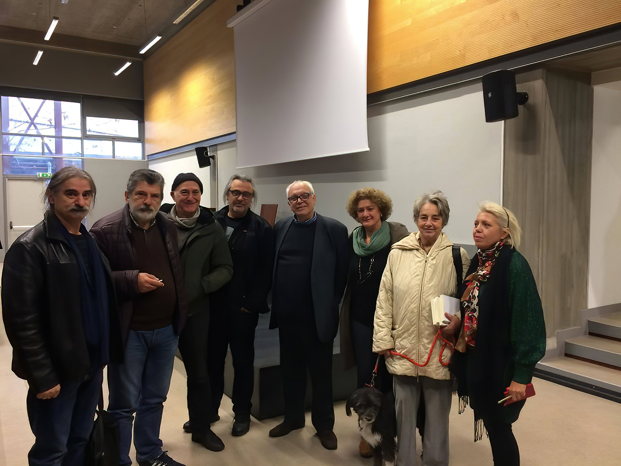 Denys Zacharopoulos — Art Historian, Theorist, and Curator — in the center (following the presentation of Efi Michalarou's book at the ASFA Amphitheater). To his left: then-Rector Mr. Nikos Tranos, artist Manolis Baboussis, Vice-Rector Mr. Yorgos Harvalias, and former Rector Mr. Panos Charalambous. To his right: President of the Association of European Journalists Ms. Saia Tsaousidou, artist Lizi Kalliga, and Journalist, Art Critic & Exhibition Curator — author of the book — Efi Michalarou, Apr. 2019, Dimitris Lempesis Archive