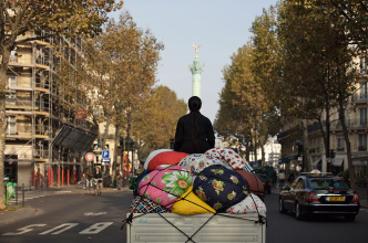 Kimsooja, Bottari-truck – Migrateurs, 2007-09, Color photograph, 128 x 182,5 x 25,5 cm light box. Musée national de l’histoire de l’immigration Collection, Photo: © Thierry Depagne, Courtesy of MAC VAL and Kimsooja Studio