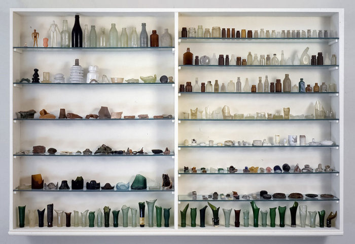 Mark Dion, Riding Neptune's vault. Cabinet A, 1997/98, Showcase with fragments of glass, iron, plastic, Private collection