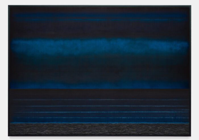 Teresita Fernández, Liquid Horizon 4, 2025, Solid charcoal, sand, and mixed media on aluminum panel, 60 x 84 x 2 inches, 152.4 x 213.4 x 5.1 cm, © Teresita Fernández, Courtesy the artist and Lehmann Maupin Gallery