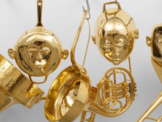 Hugh Hayden. Harlem (detail), 2024. 24 karat gold, cast iron, copper pots, brass instruments, stainless steel. 72 x 98 x 30 in. © Hugh Hayden. Courtesy of Lisson Gallery