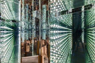 Lee Bul, Via Negativa, 2022 (reconstruction of 2012 work), Wood, acrylic mirror, two-way mirror, LED lighting, wood stain, English and Korean editions of The Origin of Consciousness in the Breakdown of the Bicameral Mind, Approx. 290 x 600 x 600 cm, Installation view of Lee Bul: From 1998 to Now, Leeum Museum of Art, Seoul, 2025, Courtesy of the artist and BB&M, © Lee Bul. Photo: Jeon Byung-cheol Courtesy of the artist and Leeum Museum of Art
