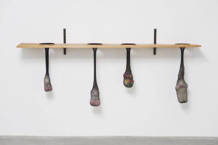 Nayland Blake, White Hares in Holes 1996, Nylon, wood, and plush toys, 35½ × 84 × 11¼ inches; 90 × 213 × 29 cm, © Nayland Blake, Courtesy the artist and Matthew Marks Gallery