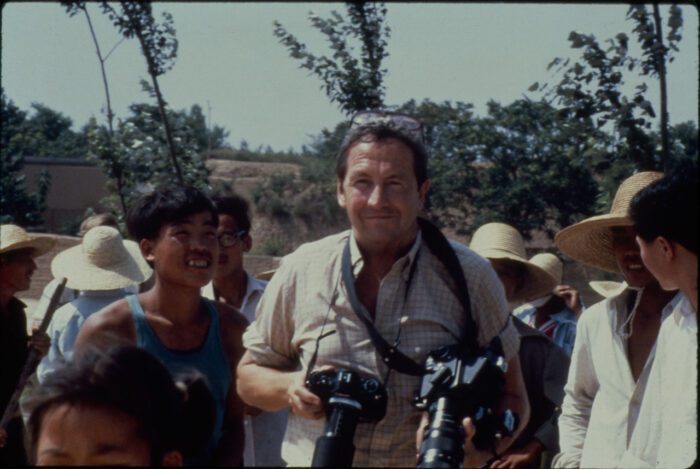 Robert Rauschenberg on the road to the world’s oldest paper mill in Anhui province, taking photographs for his thirty-metre colour photo scroll Chinese Summerhall, 1982, Donald Saff records on Rauschenberg Overseas Culture Interchange (ROCI), Robert Rauschenberg Foundation Archives, New York, Photo: Elyse Grinstein, © The Elyse Grinstein Estate, Image courtesy of Robert Rauschenberg Foundation