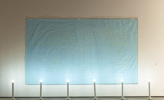 Bahc Yiso, Wide World Wide, 2003, Acrylic and oil paints, light fixture, paper label on canvas, 265 × 510 × 25 cm. Leeum Museum of Art Collection. Courtesy of Leeum Museum of Art