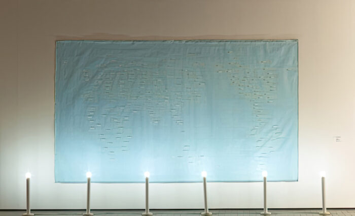 Bahc Yiso, Wide World Wide, 2003, Acrylic and oil paints, light fixture, paper label on canvas, 265 × 510 × 25 cm. Leeum Museum of Art Collection. Courtesy of Leeum Museum of Art